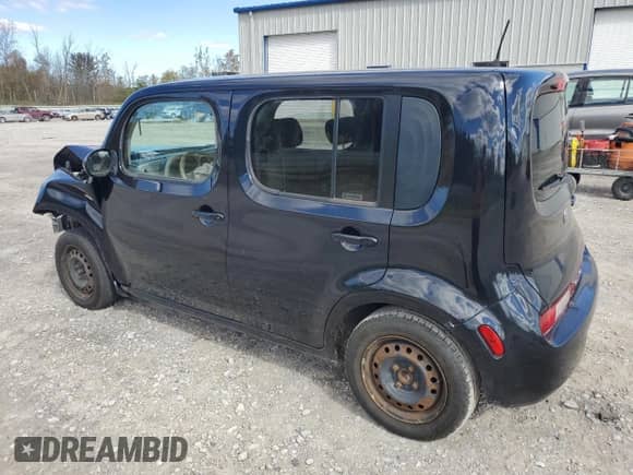 2010 Nissan Cube S with VIN JN8AZ2KR3AT170729, listed as a Copart auction lot 82282885 with 97,111 mi miles and Salvage title. Bid and sale history available at DreamBid. Image 2.