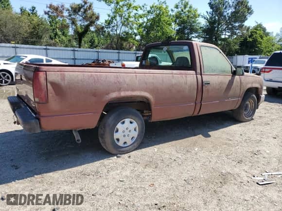 1998 GMC Sierra 1500 z VIN 1GTEC14W2WZ550452, wystawiony jako Copart lot #62010275 z przebiegiem 214 269 mil mil oraz Czysty tytuł • Clean title. Historia ofert i sprzedaży dostępna na DreamBid. Obrazek 3.