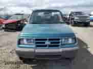 1996 Chevrolet Tracker с VIN 2CNBJ1869T6903615, выставлен на аукционе Copart как лот 49690055 с пробегом 144 821 миль миль и Списание • Salvage title. История ставок и продаж доступна на DreamBid. Изображение 5.