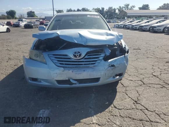 2007 Toyota Camry CE with VIN JTNBE46K773061473, listed as a Copart auction lot 70846515 with 188,466 mi miles and Salvage title. Bid and sale history available at DreamBid. Image 5.
