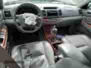 2005 Toyota Camry XLE с VIN 4T1BF30K25U606132, выставлен на аукционе Copart как лот 81264195 с пробегом 200 159 миль миль и Списание • Salvage title. История ставок и продаж доступна на DreamBid. Изображение 8.