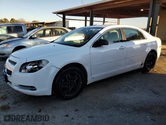 2009 Chevrolet Malibu 1LS with VIN 1G1ZG57B094198651, listed as a Copart auction lot 86979904 with 212,658 mi miles and Salvage title. Bid and sale history available at DreamBid. Image 1.