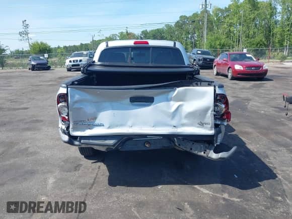 2012 Toyota Tacoma with VIN 5TFJX4CN6CX018321, listed as a IAAI auction lot 42185541 with 96,485 mi miles and . Bid and sale history available at DreamBid. Image 16.