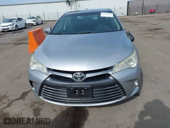 2015 Toyota Camry LE z VIN 4T4BF1FK3FR486571, wystawiony jako IAAI lot #43231806 z przebiegiem 56 105 mil mil oraz . Historia ofert i sprzedaży dostępna na DreamBid. Obrazek 12.