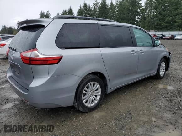 2016 Toyota Sienna XLE with VIN 5TDYK3DC9GS717149, listed as a Copart auction lot 84644415 with Not provided miles and Salvage title. Bid and sale history available at DreamBid. Image 3.
