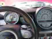 2009 MINI Hardtop S with VIN WMWMF73529TW84638, listed as a IAAI auction lot 42565544 with 60,721 mi miles and . Bid and sale history available at DreamBid. Image 7.