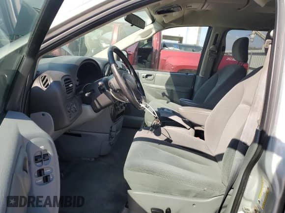 2005 Dodge Caravan SXT z VIN 2D4GP44L55R266345, wystawiony jako Copart lot #86804055 z przebiegiem 268 834 mil mil oraz Szkoda całkowita • Salvage title. Historia ofert i sprzedaży dostępna na DreamBid. Obrazek 7.