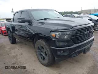 2021 Ram 1500 Lone Star z VIN 1C6RREFT6MN709754, wystawiony jako IAAI lot #42189437 z przebiegiem 73 542 mil mil oraz . Historia ofert i sprzedaży dostępna na DreamBid. Obrazek 1.