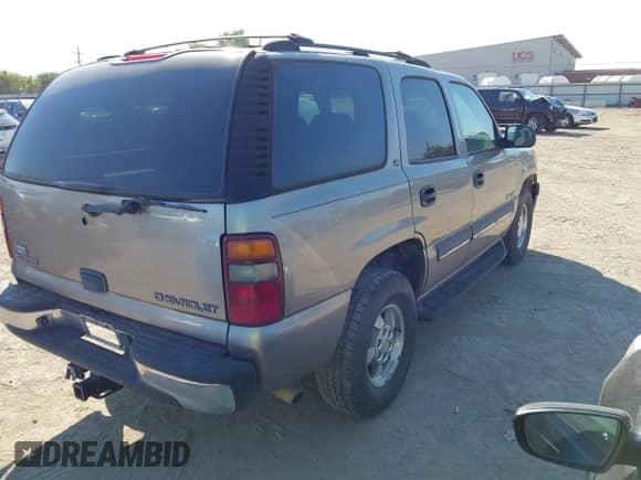 2002 Chevrolet Tahoe LS with VIN 1GNEC13Z42R257746, listed as a IAAI auction lot 43420920 with 255,761 mi miles and . Bid and sale history available at DreamBid. Image 4.