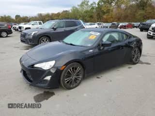 2016 Scion FR-S с VIN JF1ZNAA1XG9705809, выставлен на аукционе Copart как лот 86789895 с пробегом 150 519 миль миль и Списание • Salvage title. История ставок и продаж доступна на DreamBid. Изображение 1.