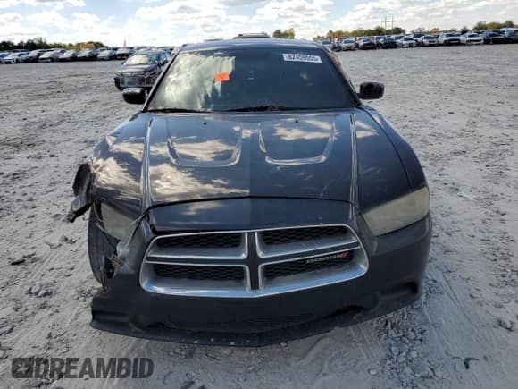 2013 Dodge Charger SE с VIN 2C3CDXBG7DH686614, выставлен на аукционе Copart как лот 82459555 с пробегом 360 562 миль миль и Списание • Salvage title. История ставок и продаж доступна на DreamBid. Изображение 5.