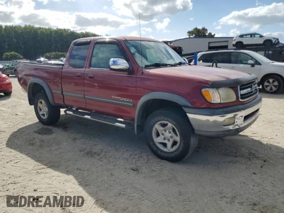 2002 Toyota Tundra SR5 z VIN 5TBRT34152S308664, wystawiony jako Copart lot #84883185 z przebiegiem 126 359 mil mil oraz Szkoda całkowita • Salvage title. Historia ofert i sprzedaży dostępna na DreamBid. Obrazek 4.