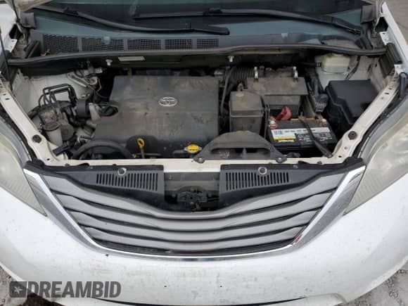 2012 Toyota Sienna XLE with VIN 5TDYK3DC8CS205280, listed as a Copart auction lot 81258065 with 185,820 mi miles and Salvage title. Bid and sale history available at DreamBid. Image 12.