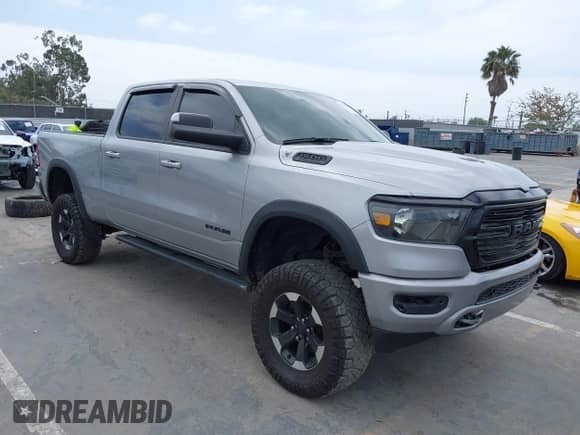 2022 Ram 1500 Big Horn z VIN 1C6RREMT2NN246600, wystawiony jako IAAI lot #42345982 z przebiegiem 21 198 mil mil oraz . Historia ofert i sprzedaży dostępna na DreamBid. Obrazek 1.