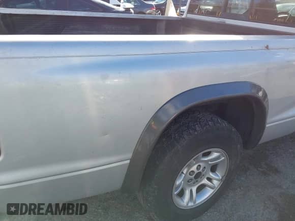 2002 Dodge Dakota z VIN 1B7GL12X42S708569, wystawiony jako IAAI lot #43535850 z przebiegiem 225 885 mil mil oraz . Historia ofert i sprzedaży dostępna na DreamBid. Obrazek 14.