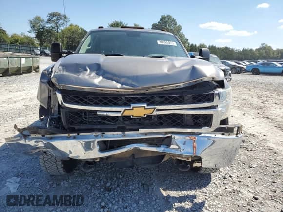 2014 Chevrolet Silverado 2500HD Work Truck z VIN 1GC1KVC83EF137290, wystawiony jako Copart lot #80095975 z przebiegiem 163 019 mil mil oraz Szkoda całkowita • Salvage title. Historia ofert i sprzedaży dostępna na DreamBid. Obrazek 5.