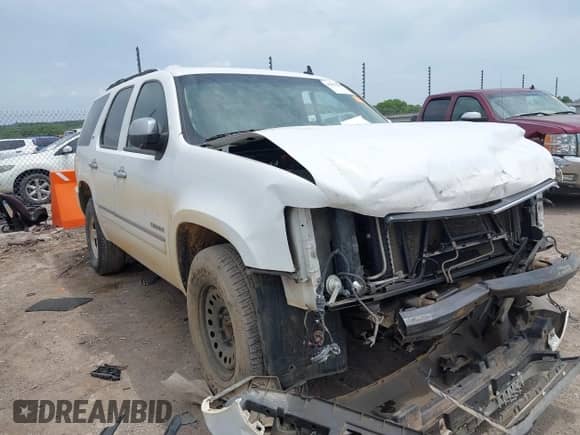 2012 Chevrolet Tahoe LTZ z VIN 1GNSCCE00CR197950, wystawiony jako IAAI lot #42393693 z przebiegiem 296 161 mil mil oraz . Historia ofert i sprzedaży dostępna na DreamBid. Obrazek 1.