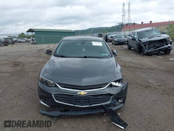 2018 Chevrolet Malibu LT z VIN 1G1ZD5ST6JF107433, wystawiony jako IAAI lot #43281943 z przebiegiem 59 802 mil mil oraz . Historia ofert i sprzedaży dostępna na DreamBid. Obrazek 12.