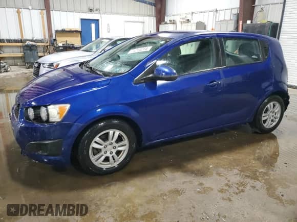 2012 Chevrolet Sonic LS with VIN 1G1JB6SH1C4191521, listed as a Copart auction lot 71214214 with 83,910 mi miles and Salvage title. Bid and sale history available at DreamBid. Image 1.