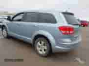 2013 Dodge Journey American Value z VIN 3C4PDCAB6DT665336, wystawiony jako IAAI lot #43511976 z przebiegiem 185 019 mil mil oraz . Historia ofert i sprzedaży dostępna na DreamBid. Obrazek 3.