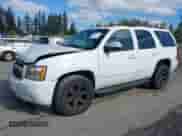 2007 Chevrolet Tahoe LTZ with VIN 1GNFK13077J118645, listed as a IAAI auction lot 43405160 with 196,940 mi miles and . Bid and sale history available at DreamBid. Image 2.