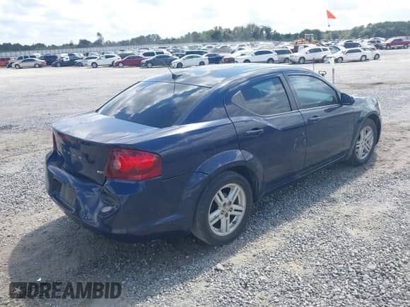 2013 Dodge Avenger SXT with VIN 1C3CDZCBXDN615817, listed as a IAAI auction lot 43282287 with 245,259 mi miles and . Bid and sale history available at DreamBid. Image 4.