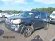 2011 Honda Pilot EX-L с VIN 5FNYF4H74BB070633, выставлен на аукционе IAAI как лот 43287327 с пробегом 228 137 миль миль и . История ставок и продаж доступна на DreamBid. Изображение 18.