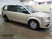 2014 Dodge Grand Caravan American Value with VIN 2C4RDGBG5ER119531, listed as a Copart auction lot 71867295 with 207,119 mi miles and Clean title. Bid and sale history available at DreamBid. Image 4.