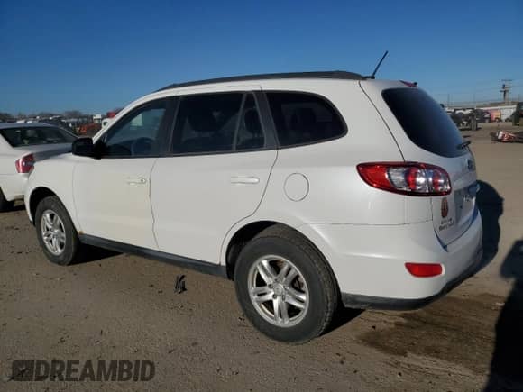 2012 Hyundai Santa Fe GLS с VIN 5XYZGDAG7CG156198, выставлен на аукционе Copart как лот 89409405 с пробегом 122 609 миль миль и Списание • Salvage title. История ставок и продаж доступна на DreamBid. Изображение 2.