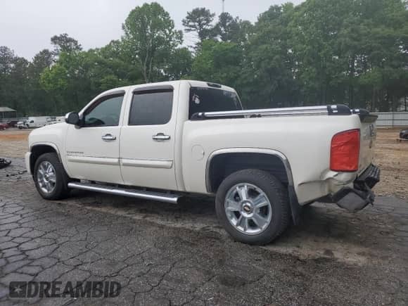 2012 Chevrolet Silverado 1500 LTZ with VIN 3GCPCTE04CG168708, listed as a Copart auction lot 54405354 with 156,487 mi miles and Salvage title. Bid and sale history available at DreamBid. Image 2.