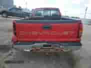 2000 Chevrolet Silverado 1500 with VIN 1GCEK14W2YE218542, listed as a Copart auction lot 64623235 with 242,232 mi miles and Salvage title. Bid and sale history available at DreamBid. Image 6.