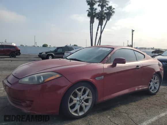 2007 Hyundai Tiburon GT с VIN KMHHN66F27U238272, выставлен на аукционе Copart как лот 59218205 с пробегом 218 279 миль миль и Списание • Salvage title. История ставок и продаж доступна на DreamBid. Изображение 1.