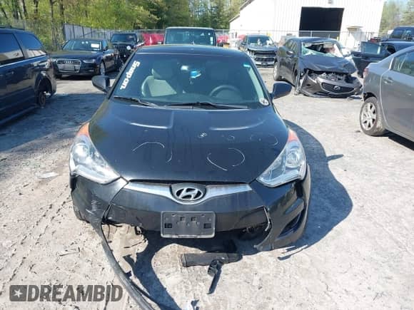 2013 Hyundai Veloster w/Black Int z VIN KMHTC6AD2DU150873, wystawiony jako IAAI lot #42234776 z przebiegiem 192 117 mil mil oraz . Historia ofert i sprzedaży dostępna na DreamBid. Obrazek 6.