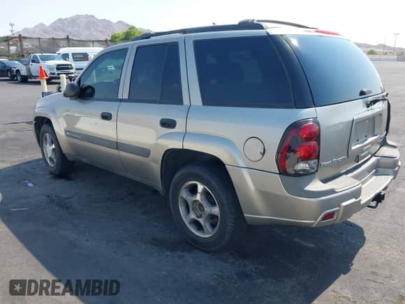 2003 Chevrolet TrailBlazer LT with VIN 1GNDS13S332297960, listed as a IAAI auction lot 42754802 with 216,615 mi miles and . Bid and sale history available at DreamBid. Image 3.