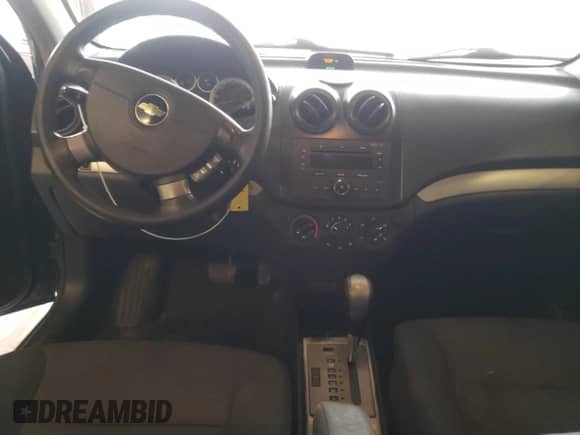 2007 Chevrolet Aveo LS z VIN KL1TD56697B119021, wystawiony jako Copart lot #67127784 z przebiegiem 178 885 mil mil oraz Szkoda całkowita • Salvage title. Historia ofert i sprzedaży dostępna na DreamBid. Obrazek 8.