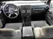 2008 Jeep Wrangler Sahara с VIN 1J8FA541X8L519597, выставлен на аукционе Copart как лот 83830965 с пробегом 141 463 миль миль и Списание • Salvage title. История ставок и продаж доступна на DreamBid. Изображение 8.