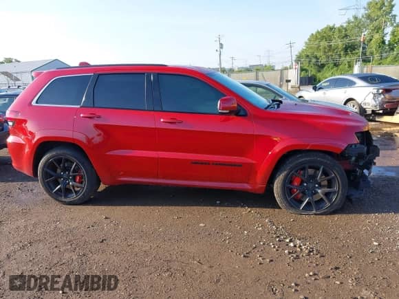 2021 Jeep Grand Cherokee SRT with VIN 1C4RJFDJ1MC818352, listed as a IAAI auction lot 42937368 with 37,574 mi miles and . Bid and sale history available at DreamBid. Image 14.