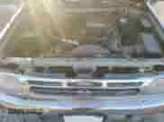 1999 Nissan Pathfinder XE with VIN JN8AR05Y4XW317915, listed as a Copart auction lot 82496174 with 301,862 mi miles and Salvage title. Bid and sale history available at DreamBid. Image 12.