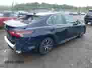 2021 Toyota Camry SE Nightshade z VIN 4T1G11AK8MU585082, wystawiony jako IAAI lot #43245347 z przebiegiem 88 301 mil mil oraz . Historia ofert i sprzedaży dostępna na DreamBid. Obrazek 4.