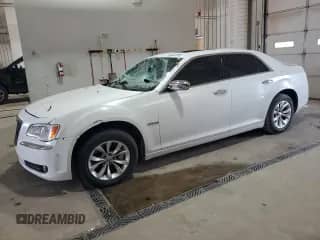 2013 Chrysler 300 C with VIN 2C3CCAET1DH551489, listed as a Copart auction lot 63487005 with 65,001 mi miles and Salvage title. Bid and sale history available at DreamBid. Image 1.