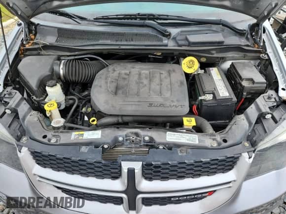2019 Dodge Grand Caravan GT z VIN 2C4RDGEG0KR619992, wystawiony jako Copart lot #83815795 z przebiegiem 58 913 mil mil oraz Nie do naprawy • Non repairable. Historia ofert i sprzedaży dostępna na DreamBid. Obrazek 12.