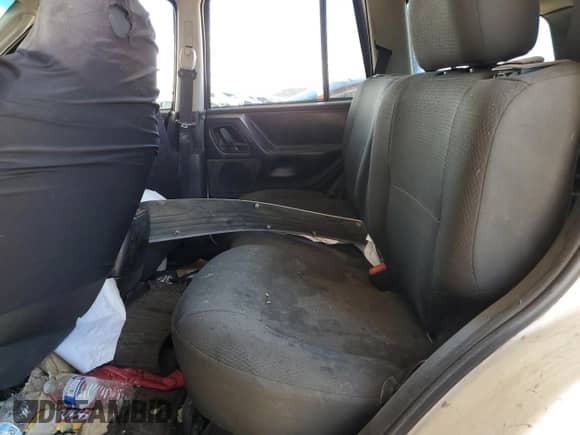 2003 Jeep Grand Cherokee Laredo z VIN 1J4GX48S53C518626, wystawiony jako Copart lot #71123695 z przebiegiem 196 154 mil mil oraz Szkoda całkowita • Salvage title. Historia ofert i sprzedaży dostępna na DreamBid. Obrazek 11.