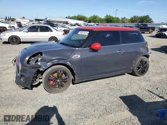 2016 MINI Hardtop John Cooper Works with VIN WMWXM9C53GT997497, listed as a Copart auction lot 56387615 with 59,852 mi miles and Salvage title. Bid and sale history available at DreamBid. Image 1.
