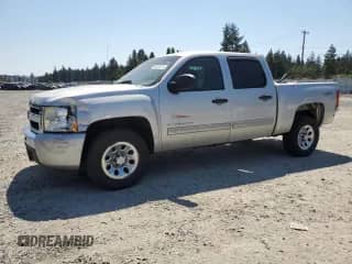 2010 Chevrolet Silverado 1500 LT with VIN 3GCRKSEAXAG210441, listed as a Copart auction lot 64805215 with 211,884 mi miles and Salvage title. Bid and sale history available at DreamBid. Image 1.
