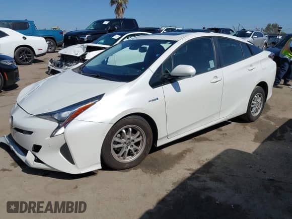2016 Toyota Prius Four z VIN JTDKARFU2G3026287, wystawiony jako IAAI lot #42527258 z przebiegiem 50 149 mil mil oraz . Historia ofert i sprzedaży dostępna na DreamBid. Obrazek 17.