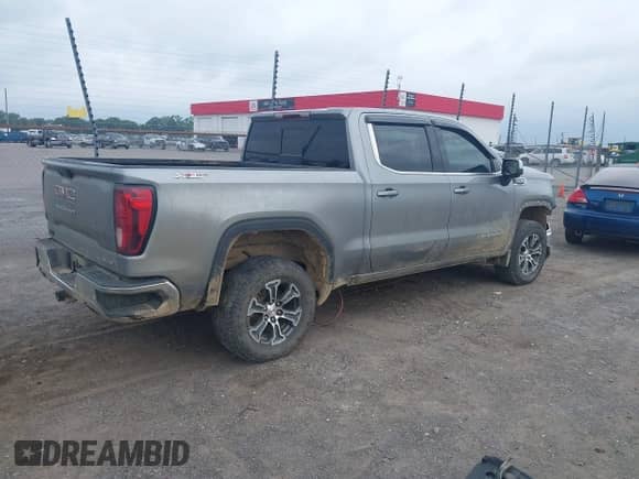 2024 GMC Sierra 1500 SLE with VIN 1GTUUBED1RZ120282, listed as a IAAI auction lot 42236278 with Not provided miles and . Bid and sale history available at DreamBid. Image 4.