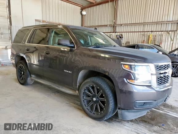 2015 Chevrolet Tahoe LT с VIN 1GNSCBKC6FR246923, выставлен на аукционе Copart как лот 71491925 с пробегом 153 212 миль миль и Списание • Salvage title. История ставок и продаж доступна на DreamBid. Изображение 4.