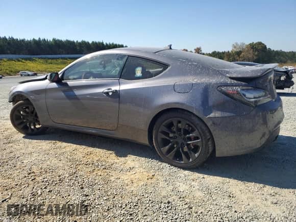 2015 Hyundai Genesis Coupe R-Spec with VIN KMHHU6KJ5FU122785, listed as a Copart auction lot 77006244 with Not provided miles and Salvage title. Bid and sale history available at DreamBid. Image 2.