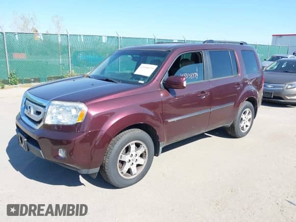 2010 Honda Pilot Touring with VIN 5FNYF4H99AB040690, listed as a IAAI auction lot 43338979 with 228,177 mi miles and . Bid and sale history available at DreamBid. Image 17.