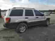 2004 Jeep Grand Cherokee Laredo with VIN 1J4GX48S04C313409, listed as a Copart auction lot 68535425 with Not provided miles and Salvage title. Bid and sale history available at DreamBid. Image 3.